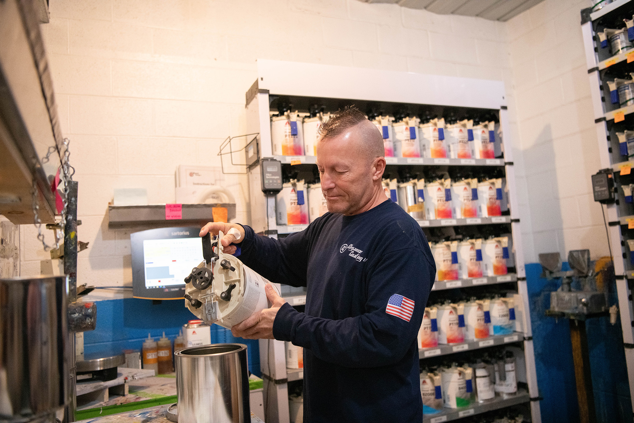 Man pouring paint