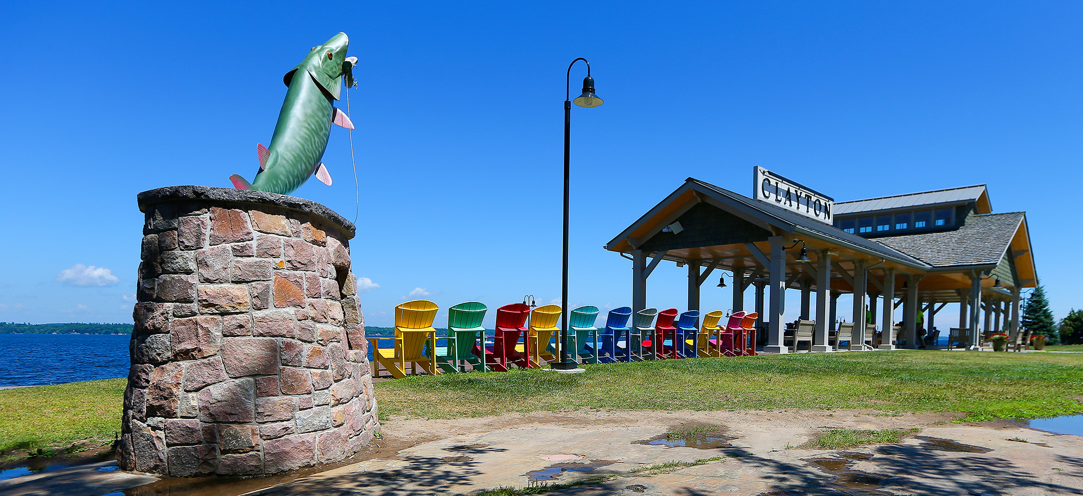 Adirondack chairs and fish statue